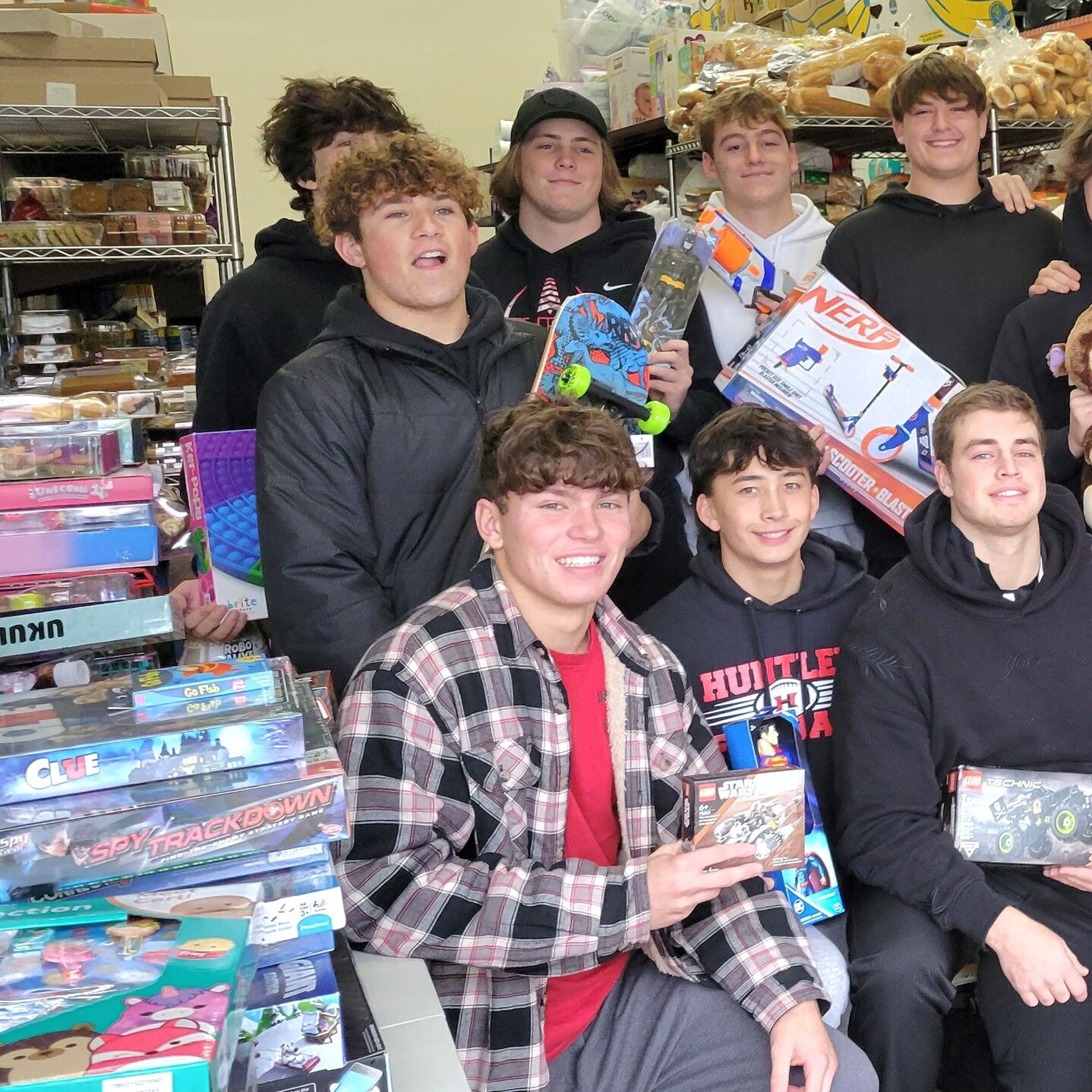 The Huntley High School Football Program under the leadership of Coach Naymola, conducted their 12th Annual Holiday Promise Program, presenting more than 300 toys and gifts to Grafton Food Pantry. The program, started by Chase Burkart, a former playe