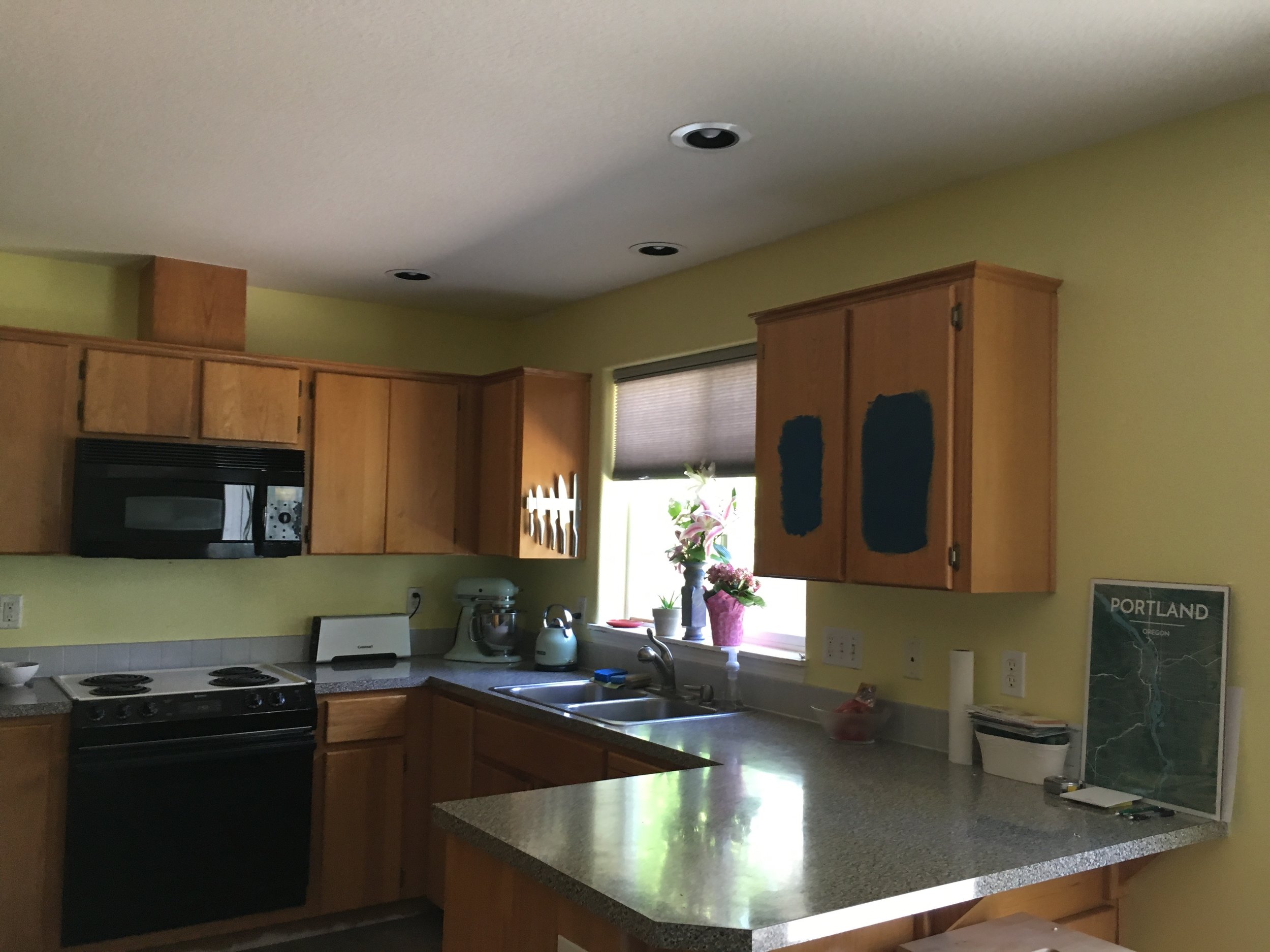 Removed the wallpaper border and started testing paint swatches
