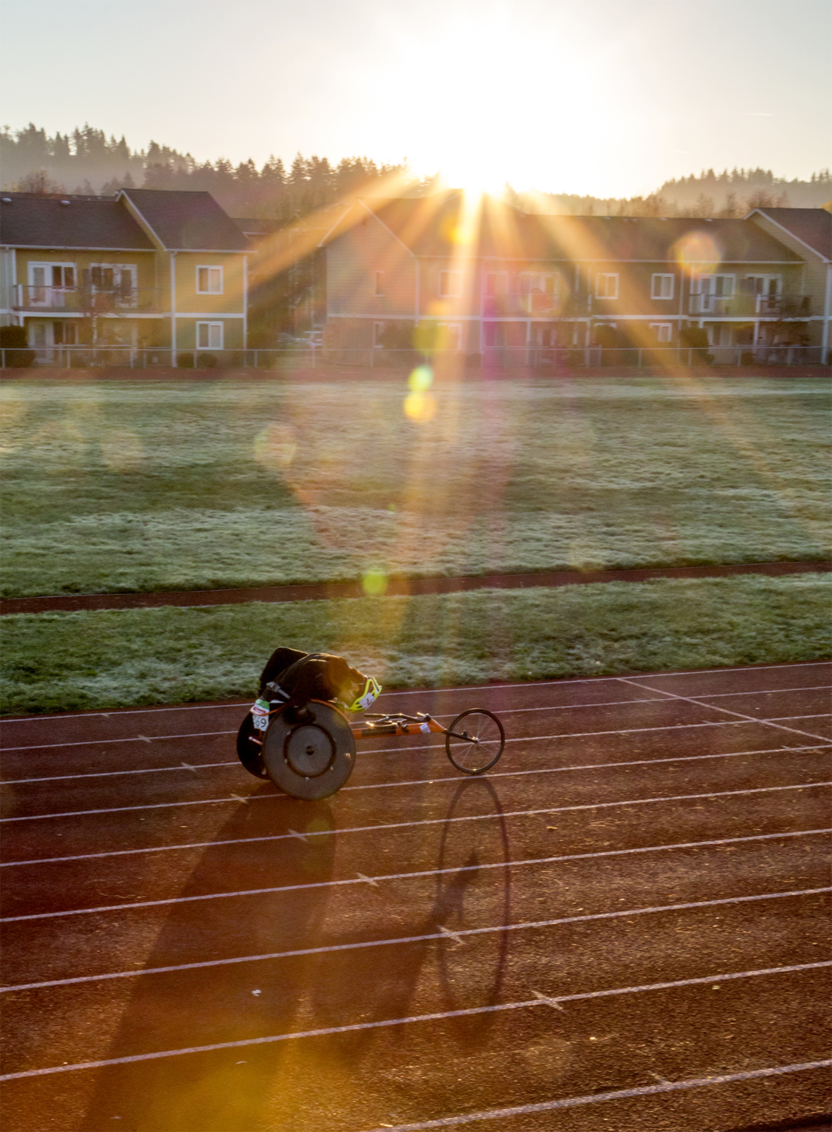  The sun rises above the South Eugene Eugene High School track, a light dusting of frost covers the grass in the early morning, and John Robert steadily grinds away at his workout with his head down. Roberts has been a para-athlete since he was 12 ye