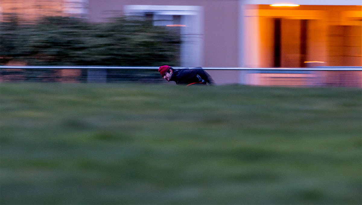  As the sun dips below the horizon, porch lights come on, and dark clouds form overhead John continues his training, pushing the wheels of his bike around the South Eugene Track.&nbsp; 