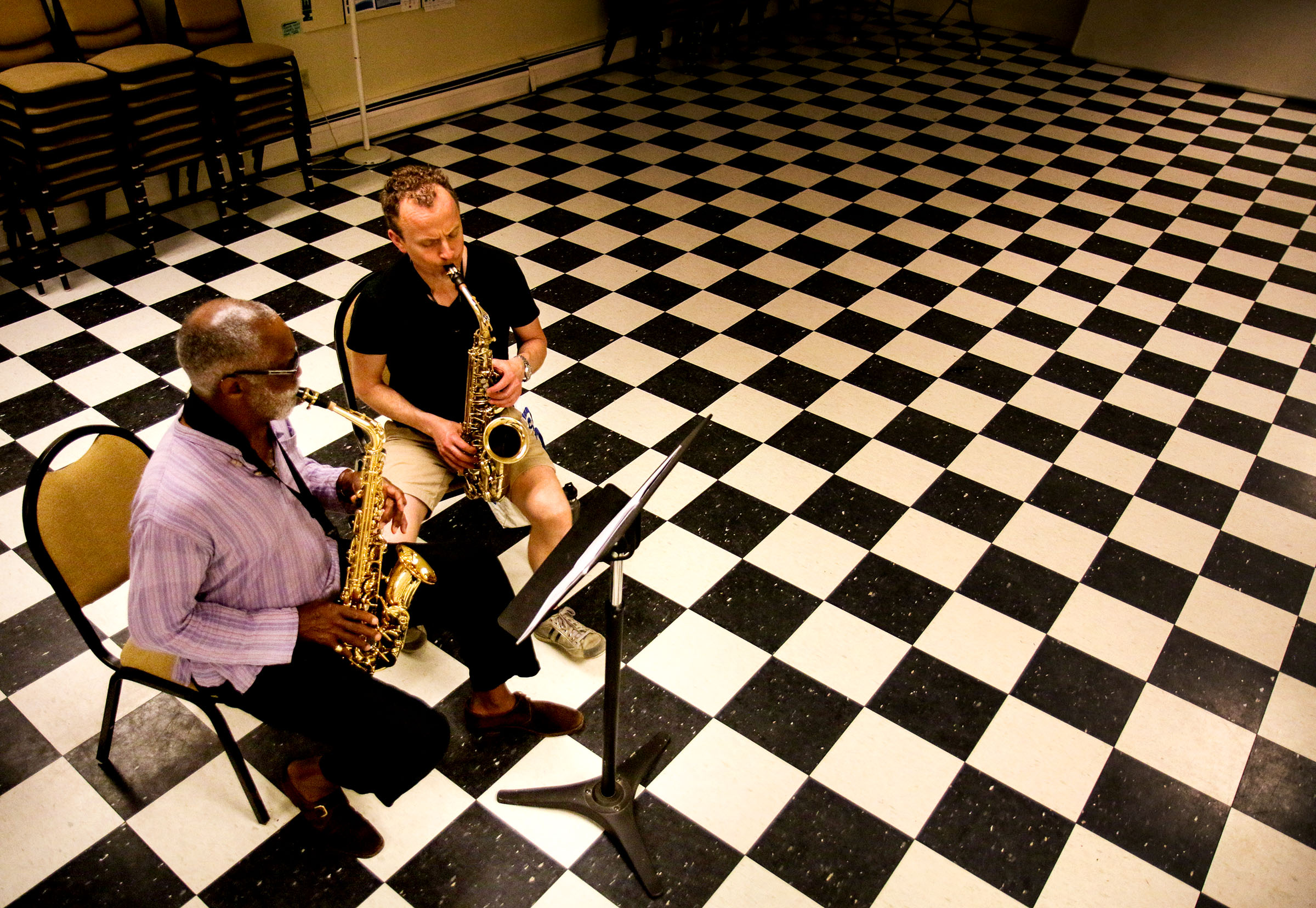   Mendon, Vt., resident Al Wakefield, left, takes a lesson from Dartmouth classical saxophone lecturer Michael Zsoldos, of Woodstock, Vt., at The North Chapel in Woodstock on Wednesday, July 11, 2018. Wakefield was one of 70 students Interplay Jazz b