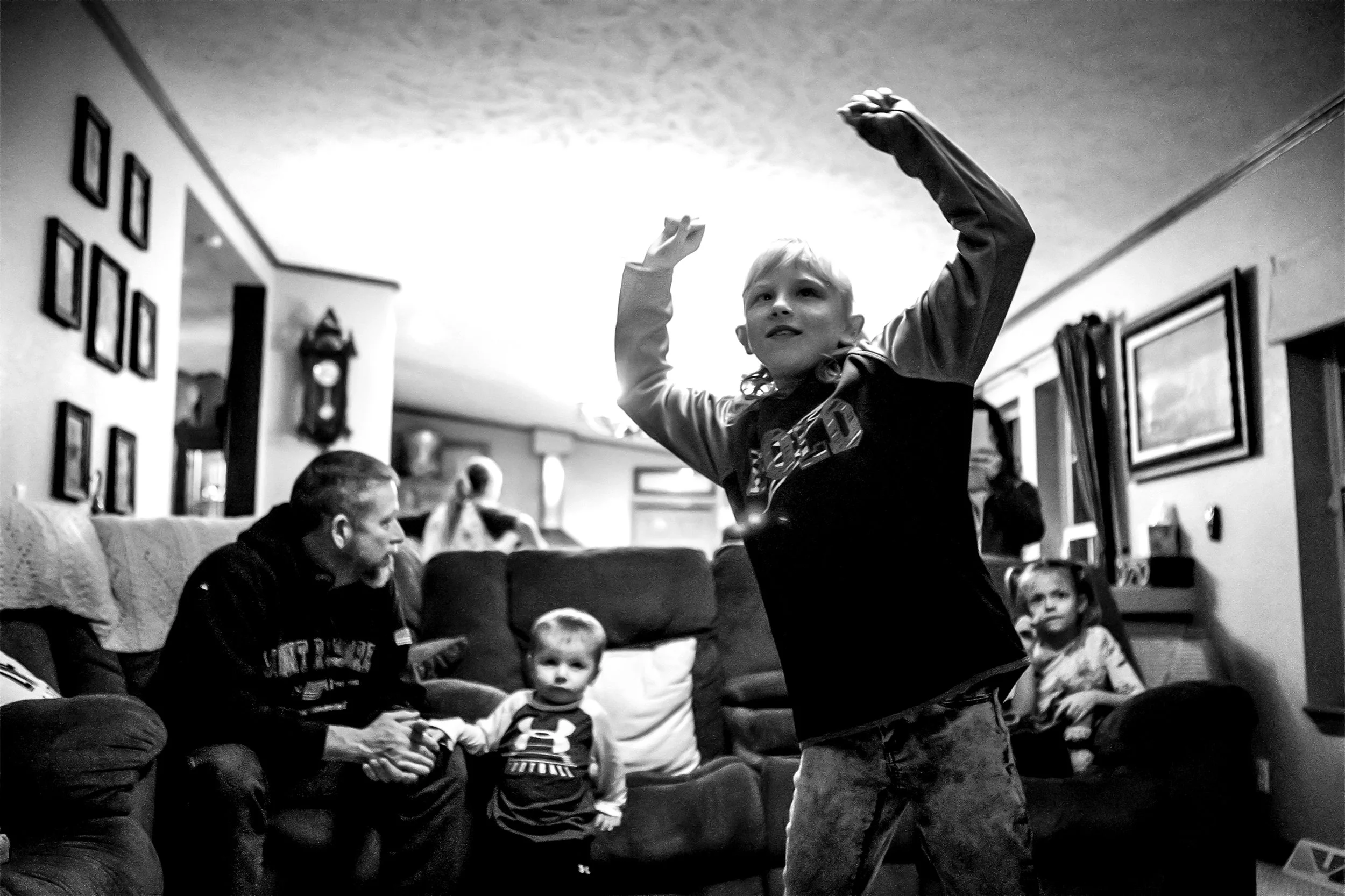  Natalia plays a dance game on the Xbox Kinect during a get-together with the Pfeil family on Wednesday, Jan. 9, 2019. The four weeks begin with smiles and end with tears. If all goes well and both parties say yes, soon the orphans will be able to ca