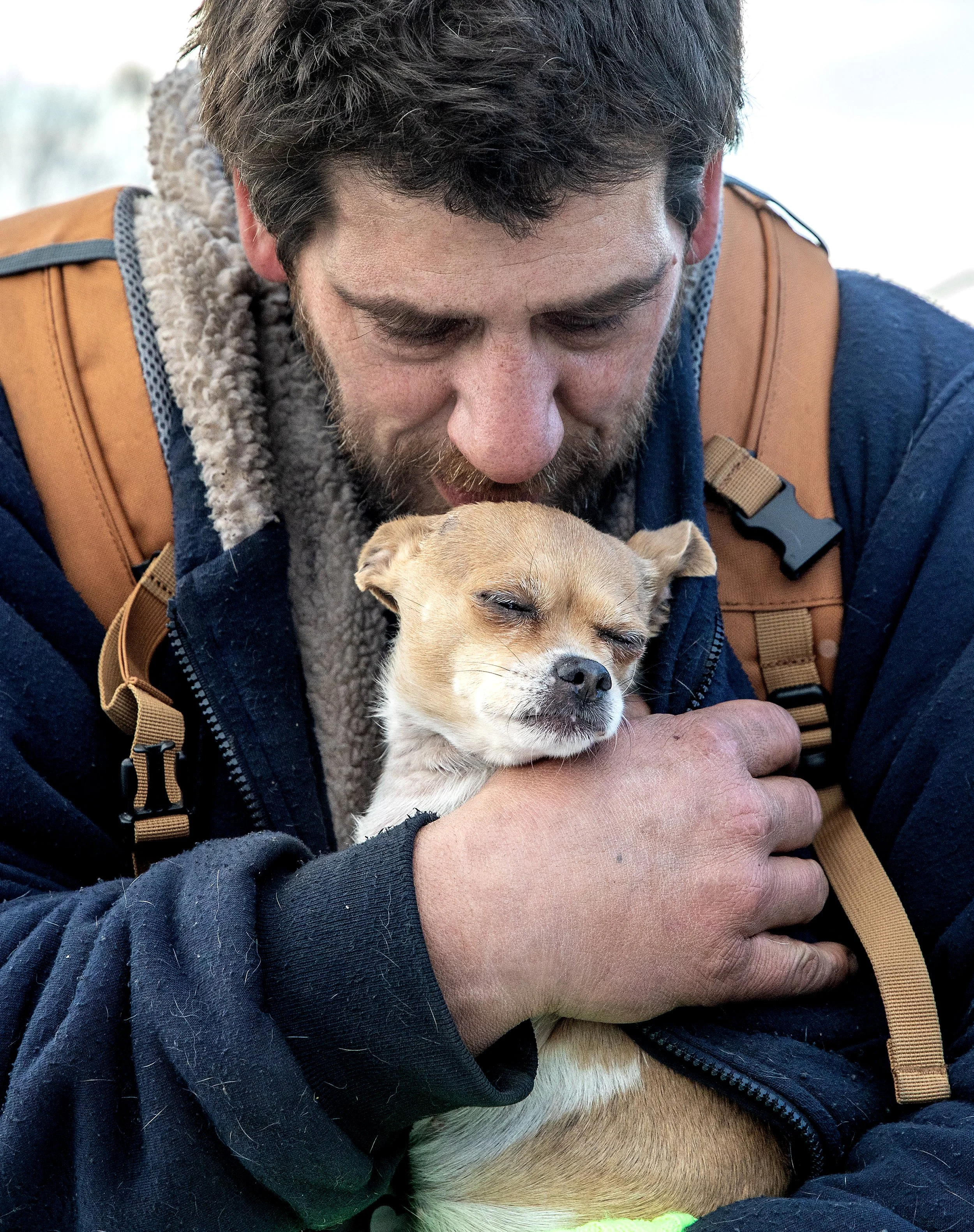  Scott Darrington holds his dog Big Pimpin tight within his jacket as he gets ready for a doctors appointment Friday, Jan. 12, in Clarkston. Darrington, who has a deformed heart and experiences seizures, will turn 47 this week. He said he was given t