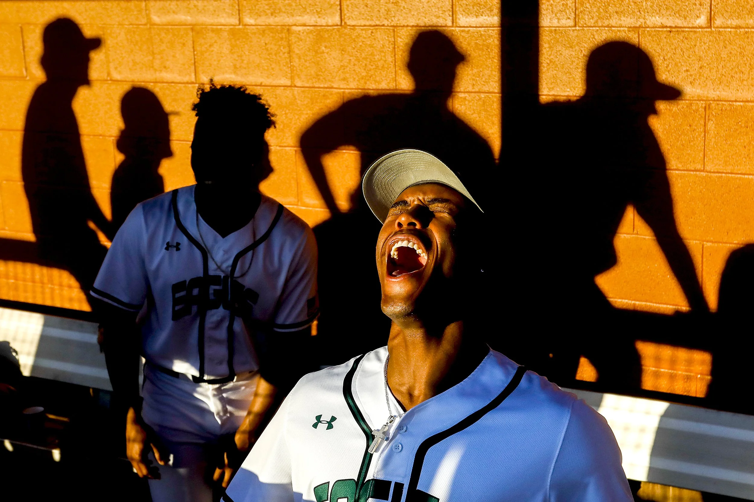  Ryan Jeffers yells out “show me the money!” as he and his fellow Central Methodist teammates trade off shouting the phrase before their game against Indiana Southeast on Saturday, May 29, 2021, in Lewiston. 