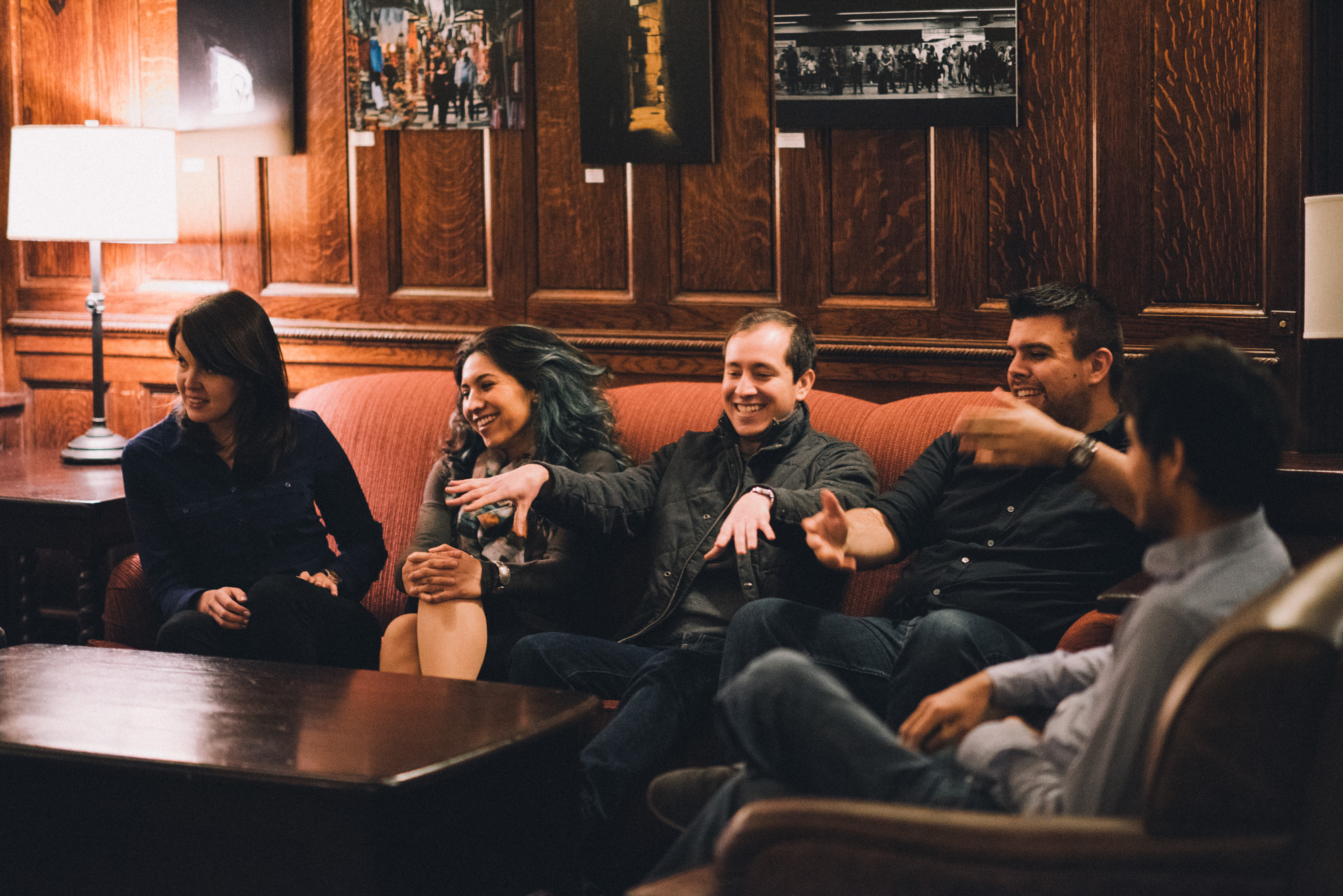 Graduate students talking in Campus Club