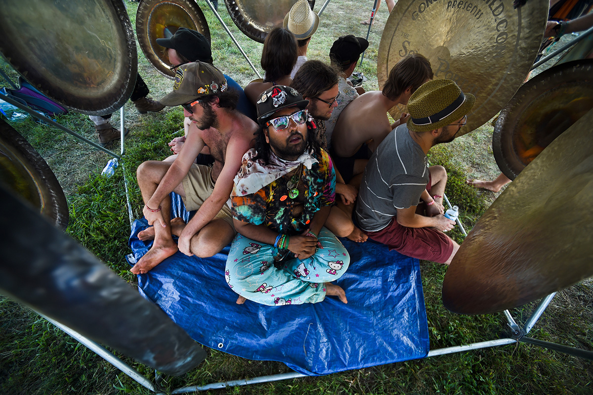 Mark Baksh joins friends in the “sonic portal spaceship,” encircled by vibrating gongs set up to help festival-goers relax at the Lockn’ music festival in Arrington, Va. Baksh said the experience felt like a “brain massage." 