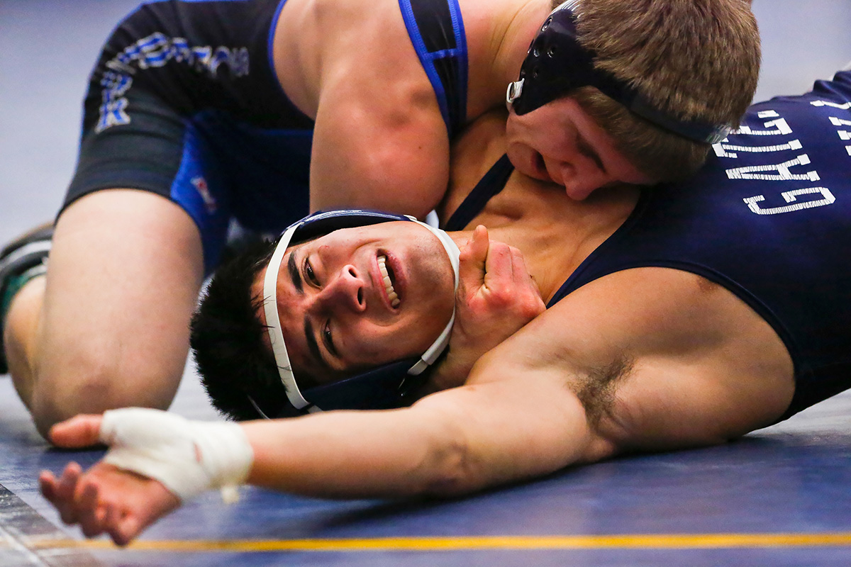 Sam Vacchetto of Webster Schroeder Warriors defeats Christian Ferrante during the quarter finals at the Monroe County League Wrestling Championship in Webster, N.Y.