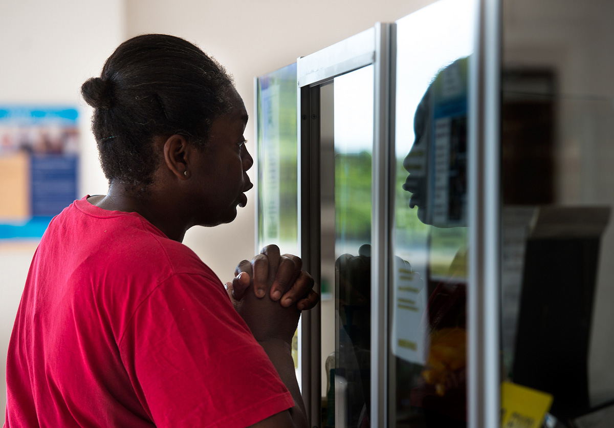 Ruby asks a social services representative for help paying her overdue electric bill in July. The Lynchburg Department of Social Services denied Ruby’s request because her son was over the age limit to qualify for assistance.