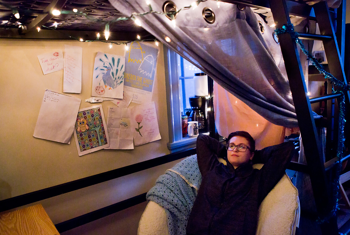 Bosch relaxes underneath their bunk bed in Madison Hall at the University of Mary Washington in Fredericksburg, Va. Bosch recently began exploring their identity and using the gender neutral pronoun 'they.' "It's so much of who you are," said Bosch, referring to gender, "that you feel like you're lying to everyone in your own skin." 