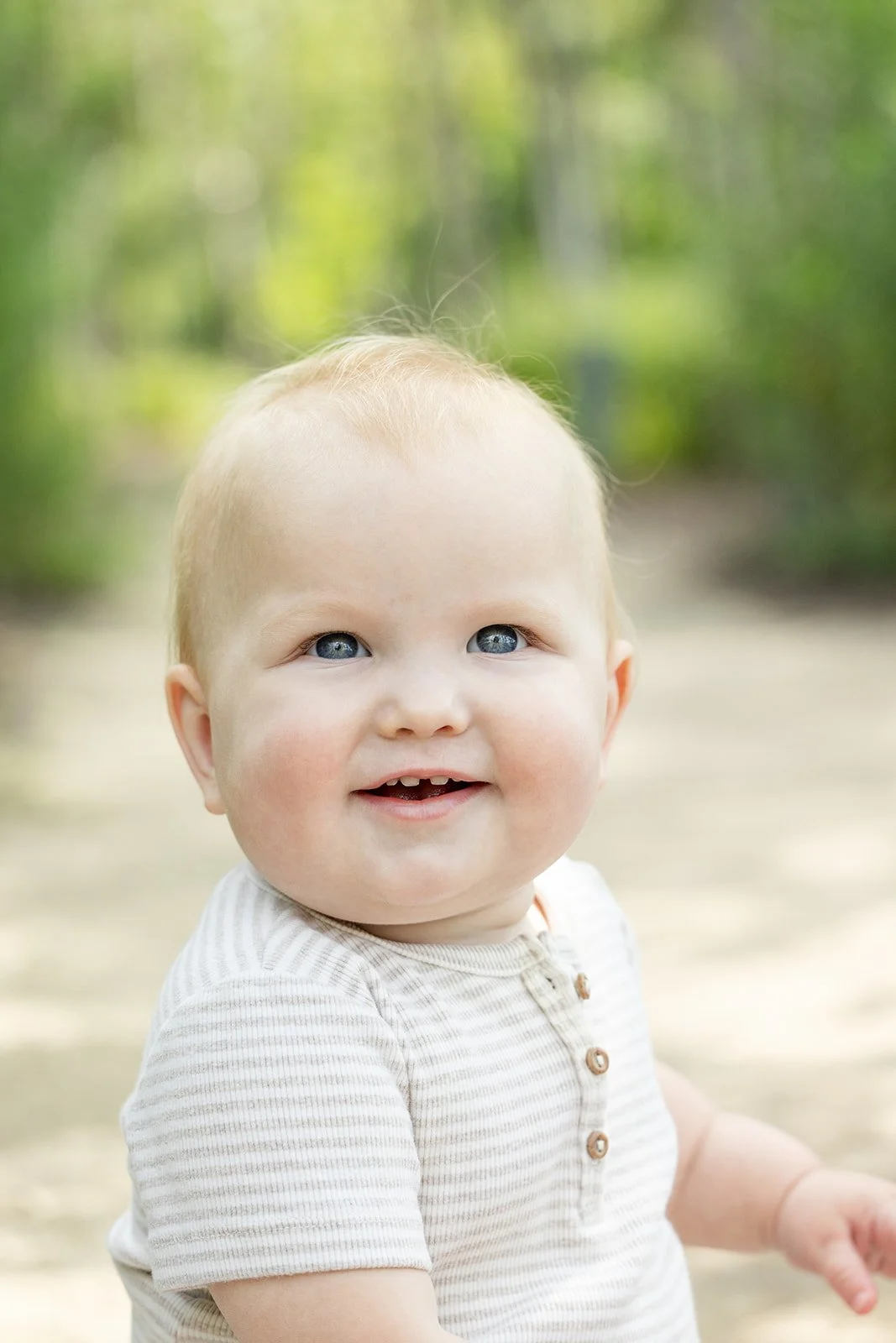 Children running and playing during outdoor family photos in Chicago