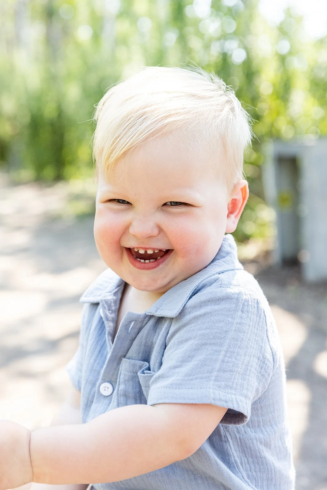 Children running and playing during outdoor family photos in Chicago
