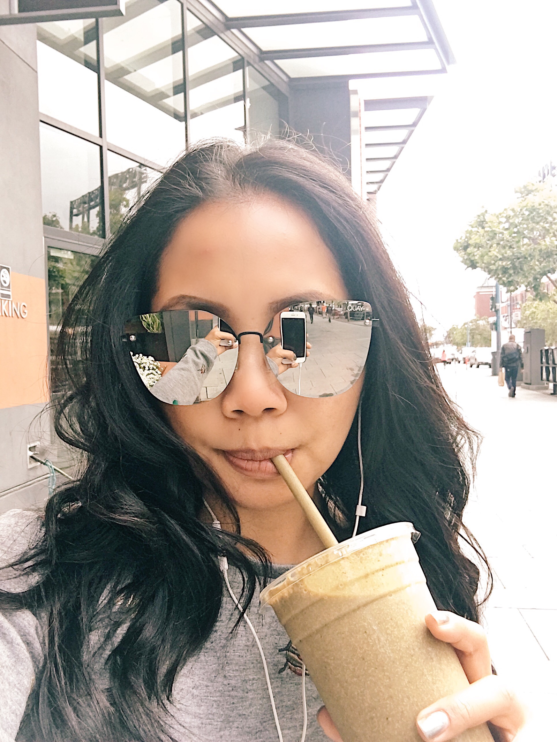 Me sipping on the smoothie from Barry's Bootcamp at the SOMA location