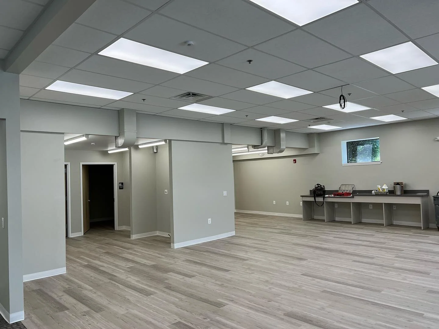 Lighting up a commercial space complete with occupancy/ vacancy sensors.