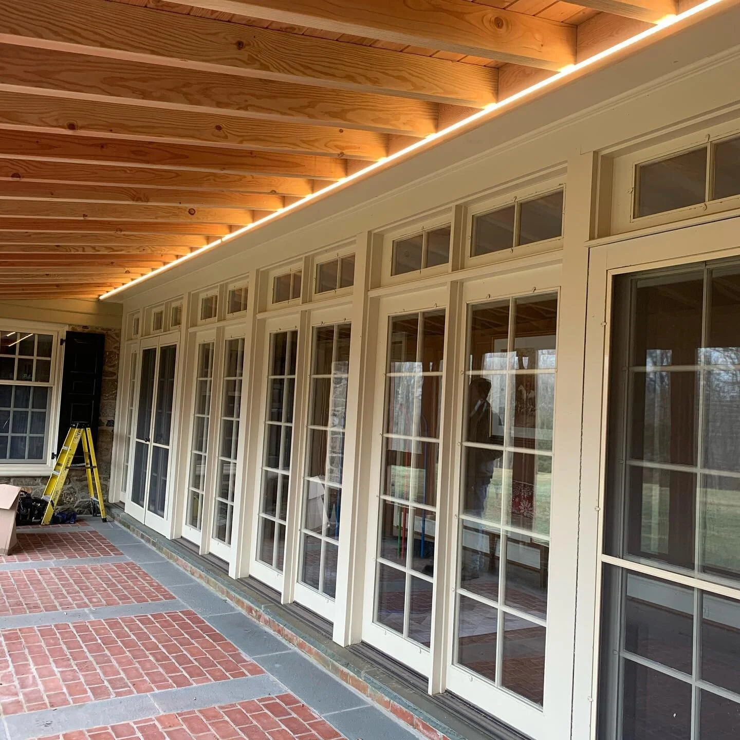 LED strip lighting on a screened in patio.