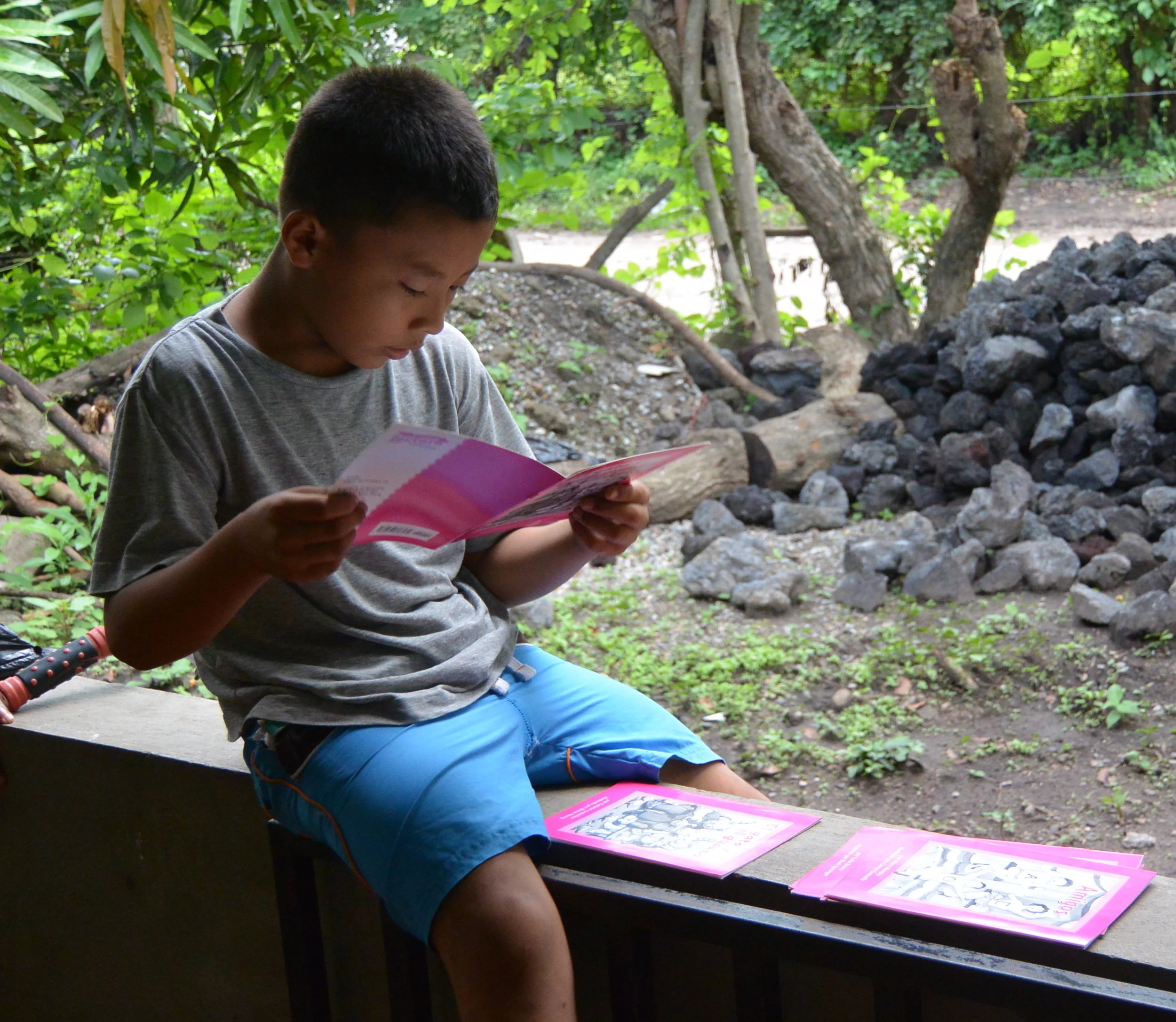 Enjoying access to books for the first time! Izote created community library in San Hilario