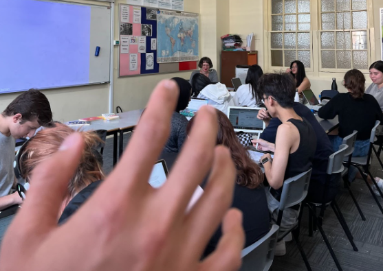 A student puts their hand up in Ms Costelloe’s WEP class; they’re busting to go to the bathroom.