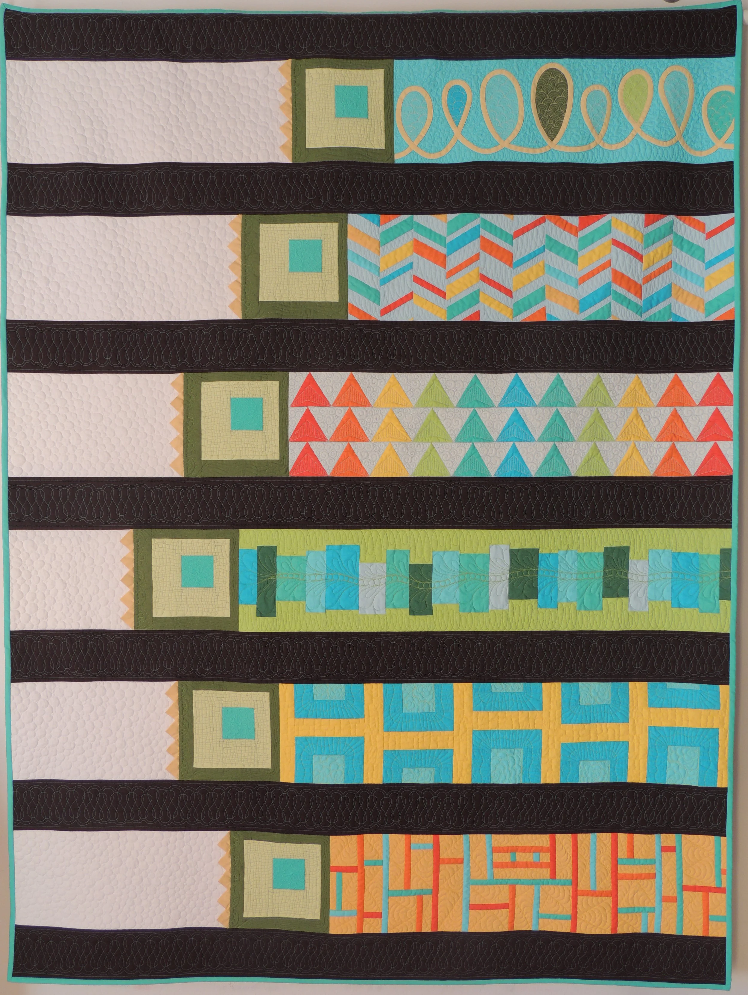 6. Fields of Quilted Dreams August 2014 54" x 71" Original modern design to celebrate the production of solid cotton fabrics that are grown and manufactured here in the United States. Exhibits/Awards: Selected as a Finalist and included in the traveling American Made Brand's Farm to Fabric Quilt Challenge exhibit (2014-2015). Blog Post