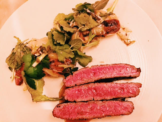 Oregon wagyu steak, spring onion, basil, boquerones
