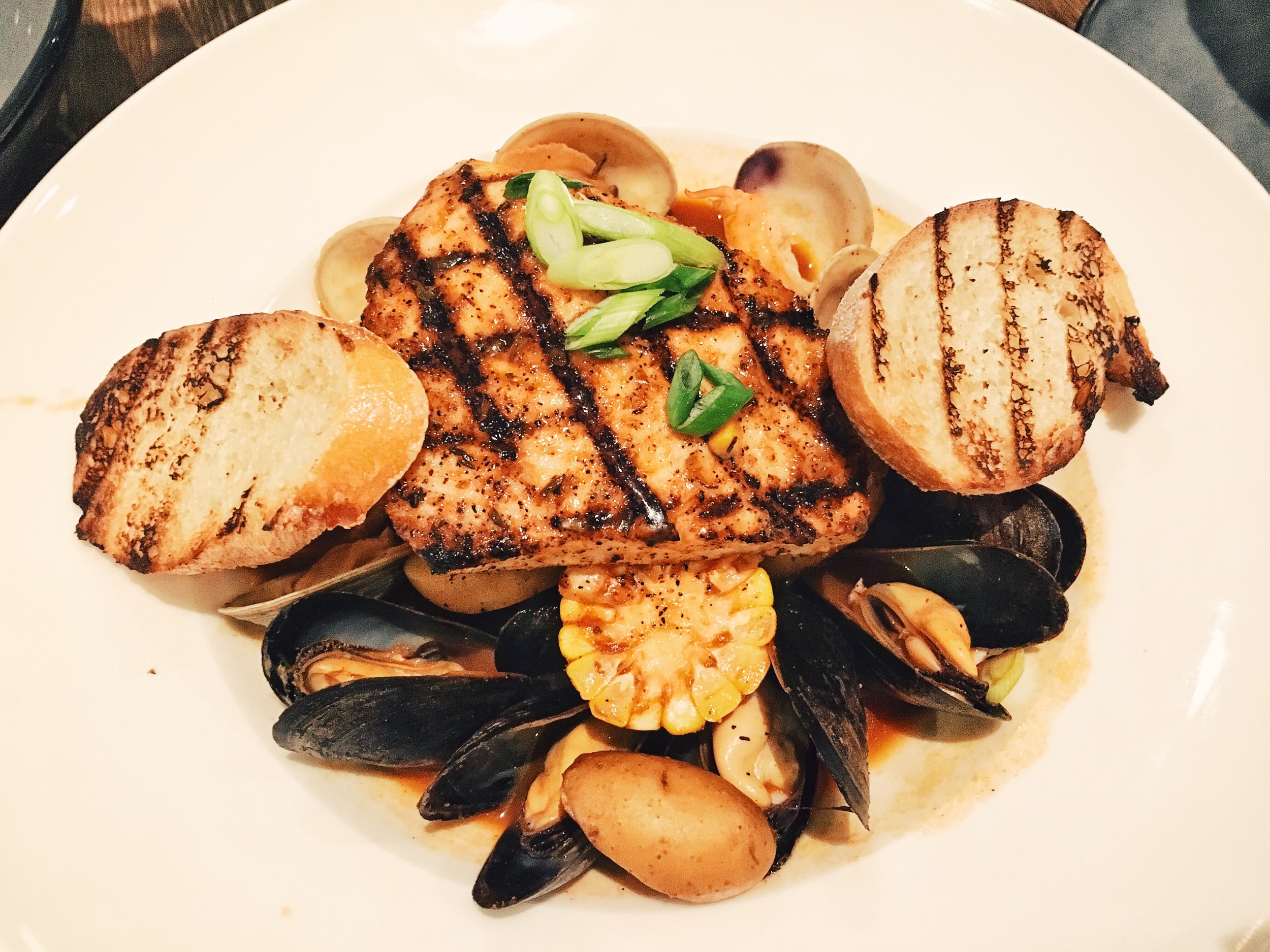 Low country boil- mussels, swordfish, potatoes, clams, shrimp, corn, spicy broth and bread. Although the broth was a bit saltier than I prefer, I absolutely loved the swordfish which was cooked just well enough.