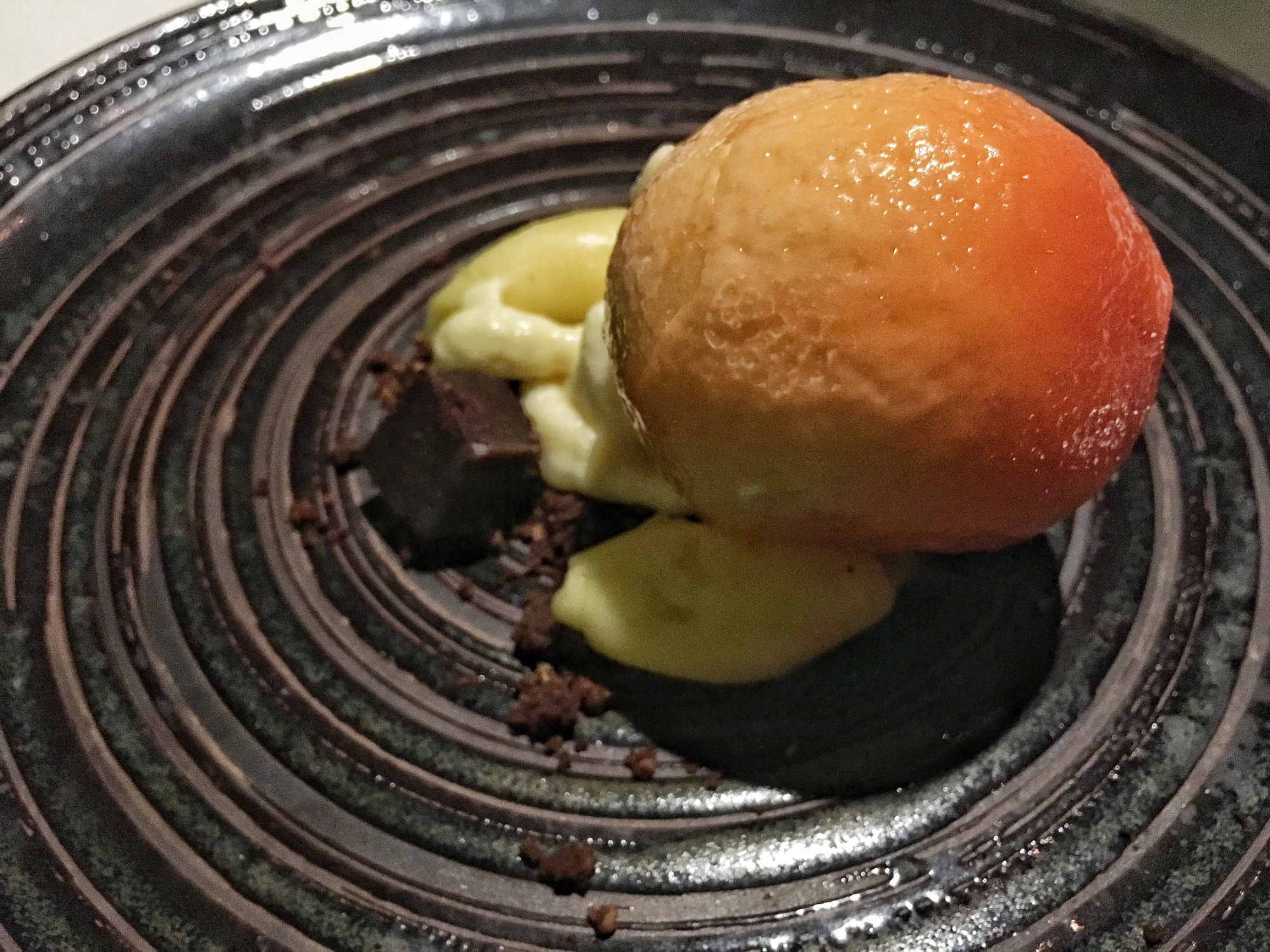 Citrus tasting- Sweet orange cream in a tangerine shaped sugar shell with chocolate and vanilla gelato. 