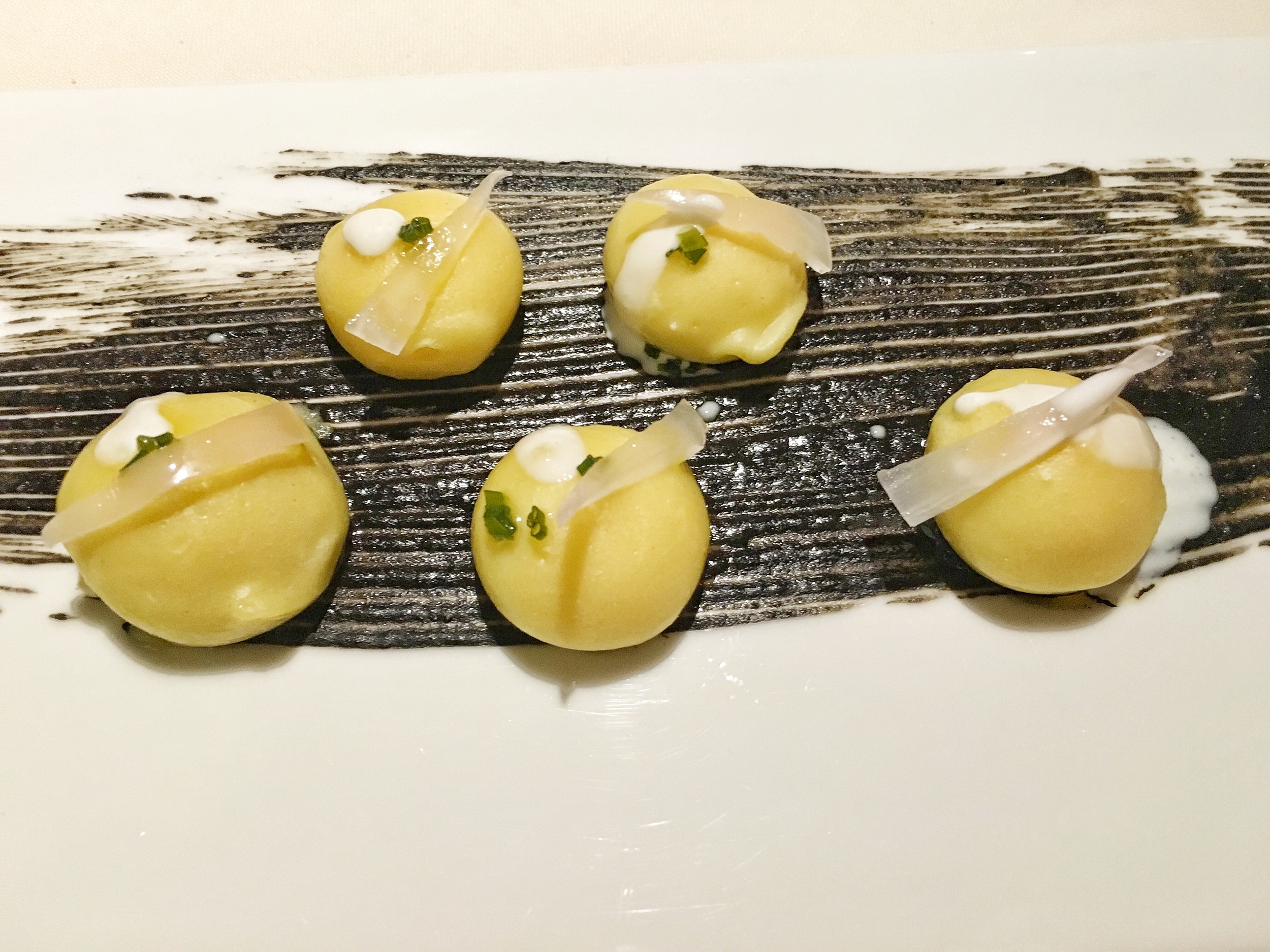 Potato gnocchi, smoked eel and squid ink