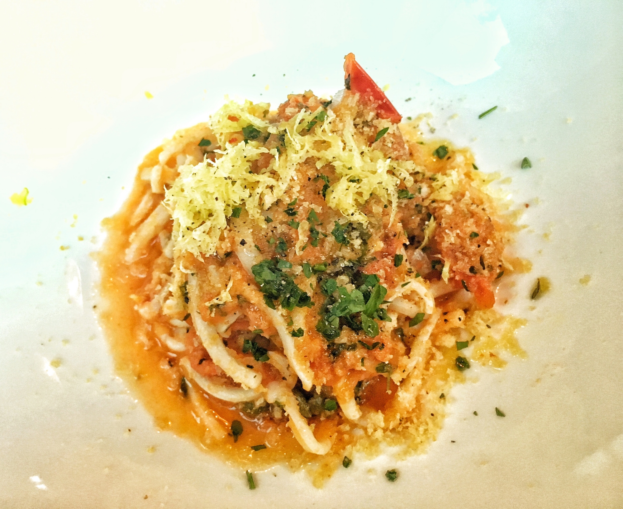 Calamari tagliatelle, pomodoro, lardo, gremolata