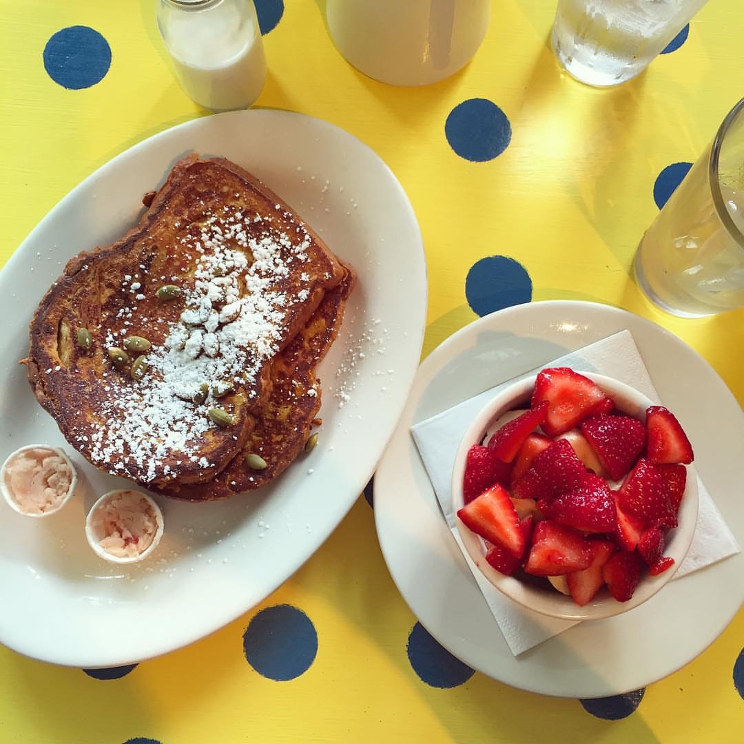 Pumpkin french toast with whipped strawberry butter and a side of strawberries PC: @spooncolumbia