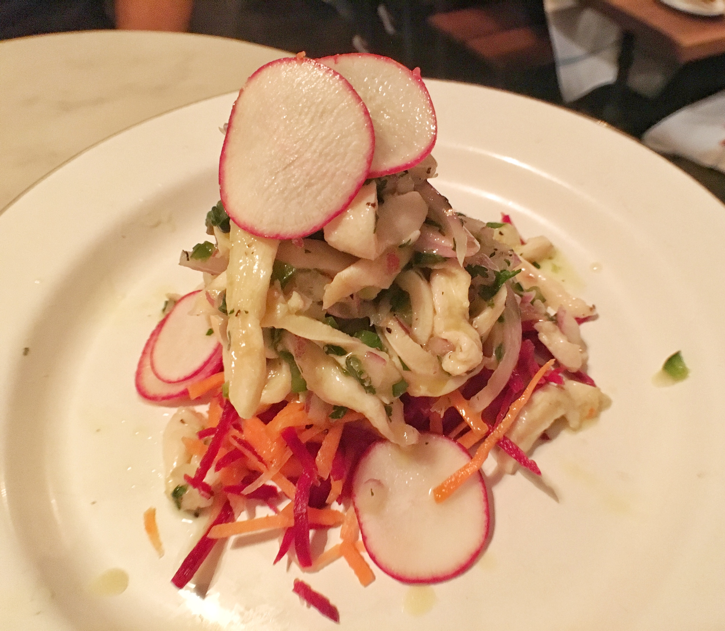 Conch ceviche with radishes and carrots