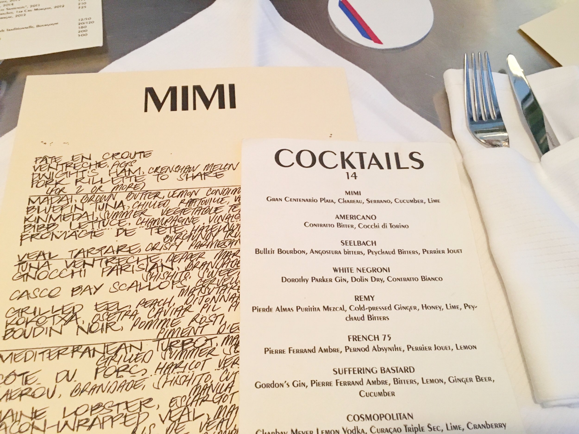 Food and cocktail menu at the bar