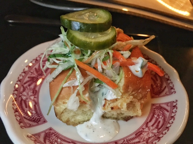 Nashville hot bun- fried chicken, little pickles, ranch, pickle brine slaw