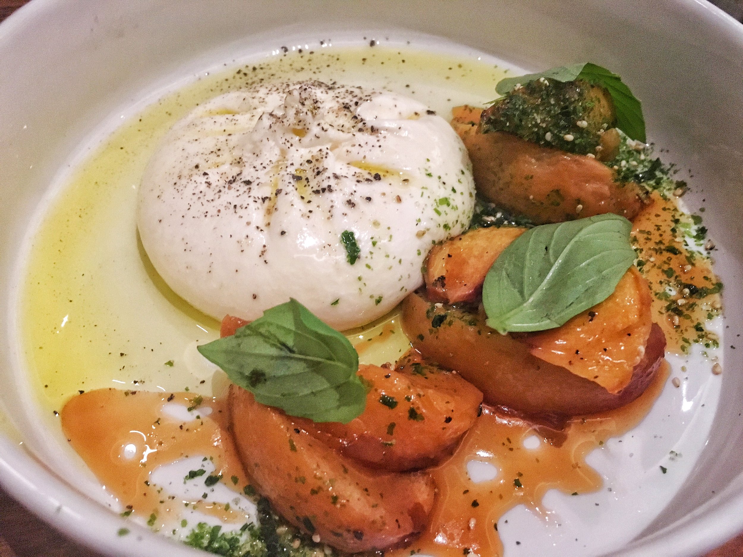 House made burrata, basil, roasted peaches, lambrusco vinaigrette 