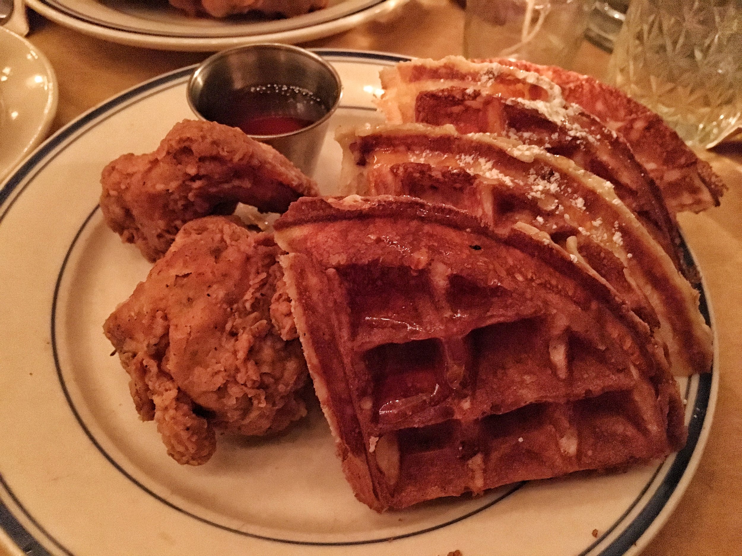 Sweet Chick chicken and spiced pecan waffle with Mike's hot honey sauce