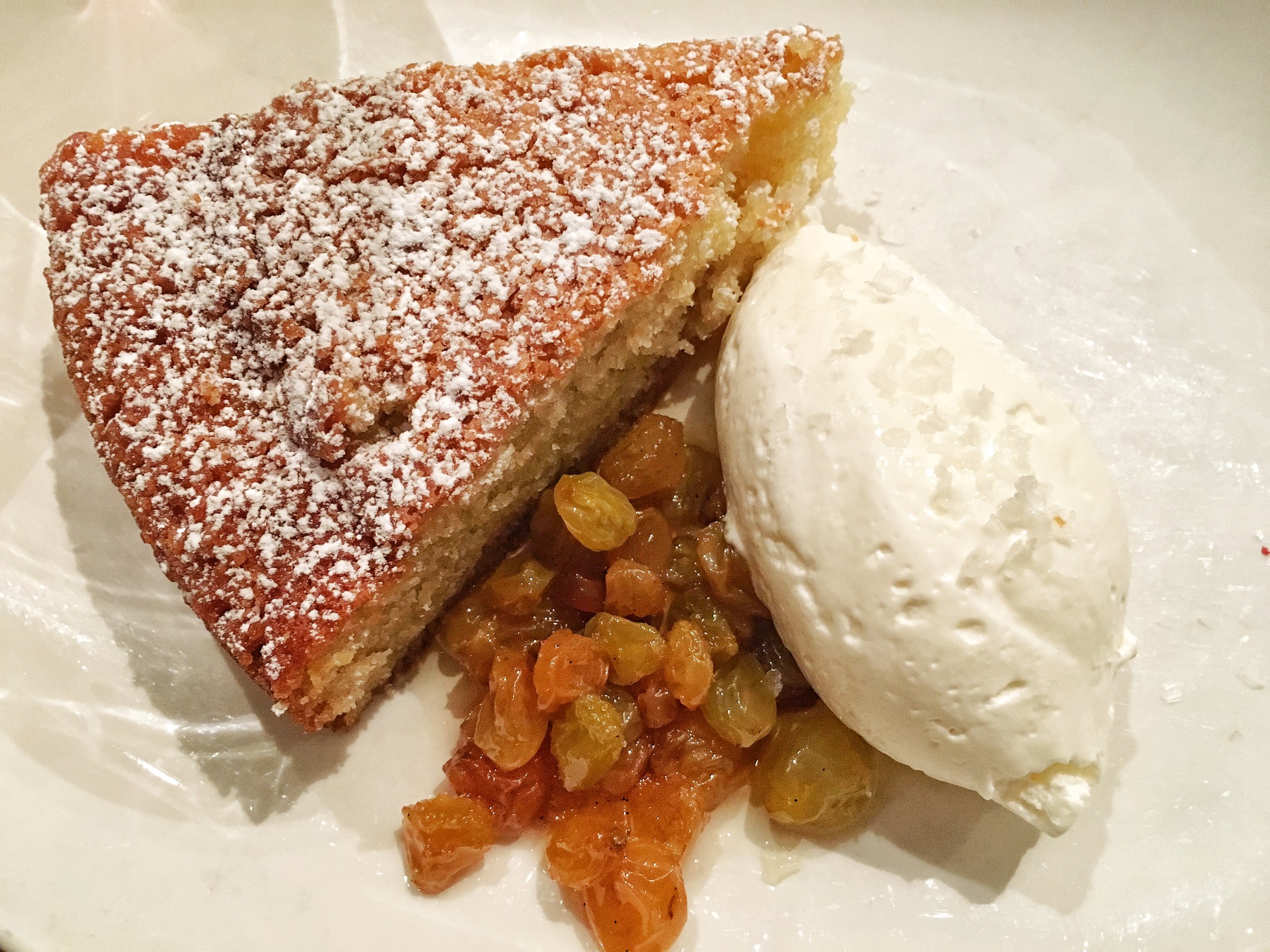 Olive oil cake, raisins, creme fraiche, vin santo