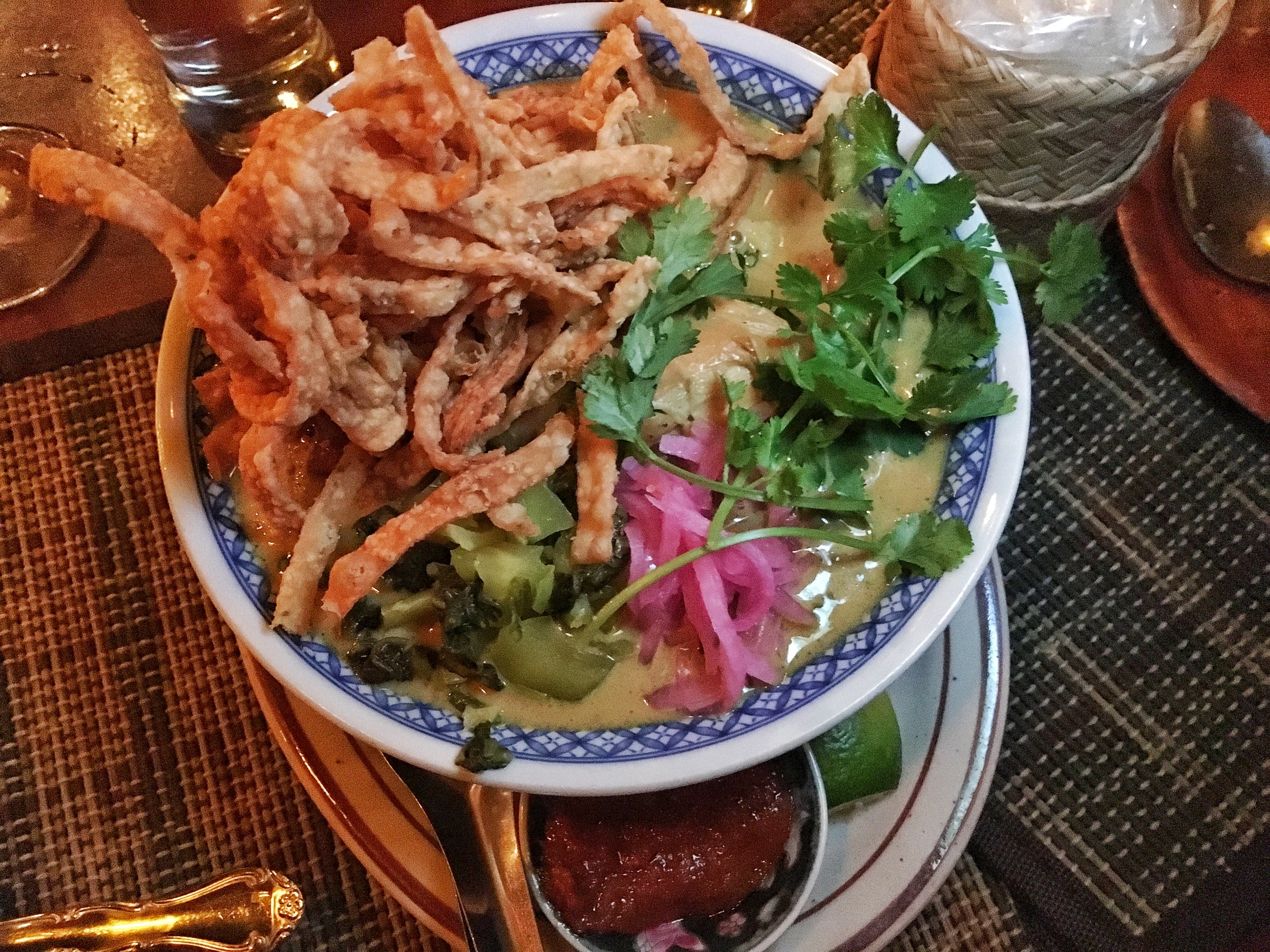 Kai Yang Muay Thai- Half chicken with dipping sauces and green mango salad