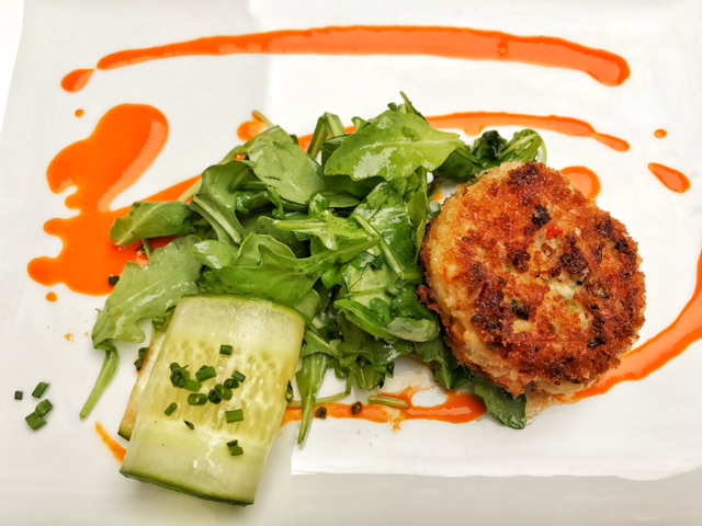 King Crab Cakes, cucumber, arugula, chives, red pepper vinaigrette 