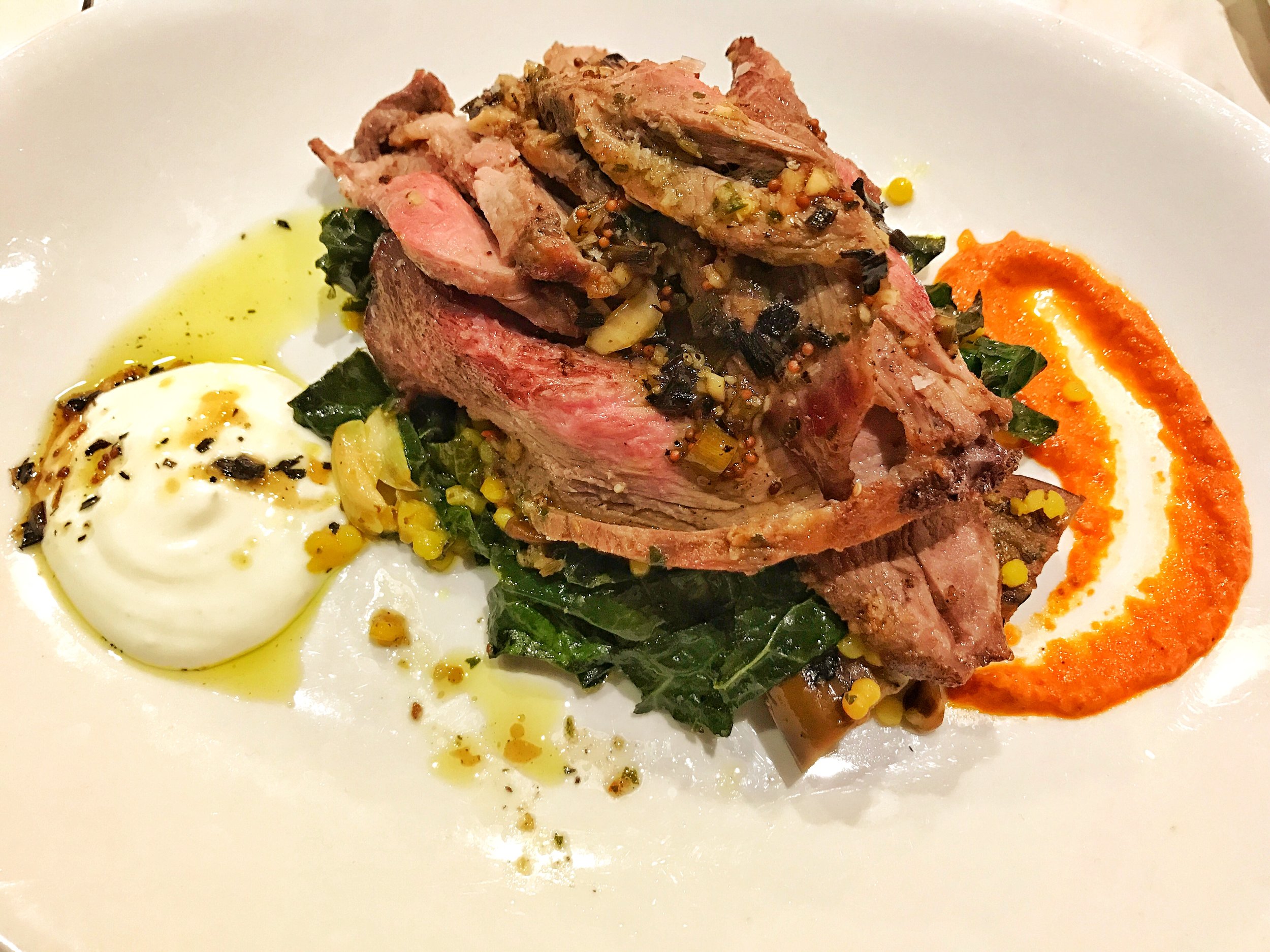 Rotisserie leg of boulder lamb with pearl pasta, pistachio, eggplant, olives, harissa, preserved lemon yogurt