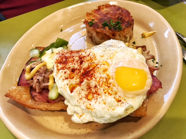 Havana Daydreaming Sammie (Free-range house pork, shaved ham, gruyere cheese, homemade pickles and a sunny side egg with Dijon hollandaise, served up open-face on a hoagie roll) 