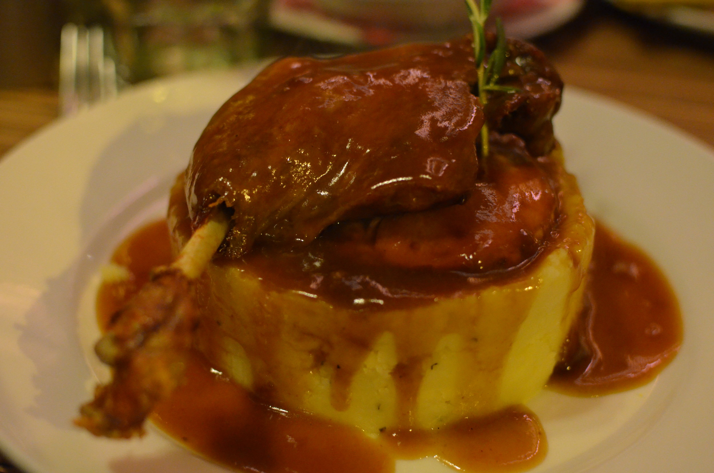 Duck confit with potato and root celery mash