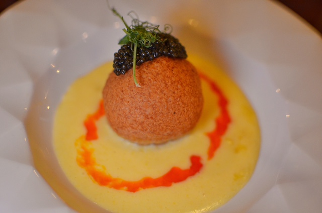 Crab Dauphine- lump crab, served on corn custard with chive oil, caviar
