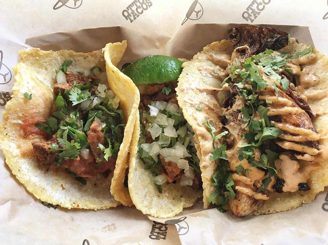 Chicken, steak and fried brussel sprouts taco