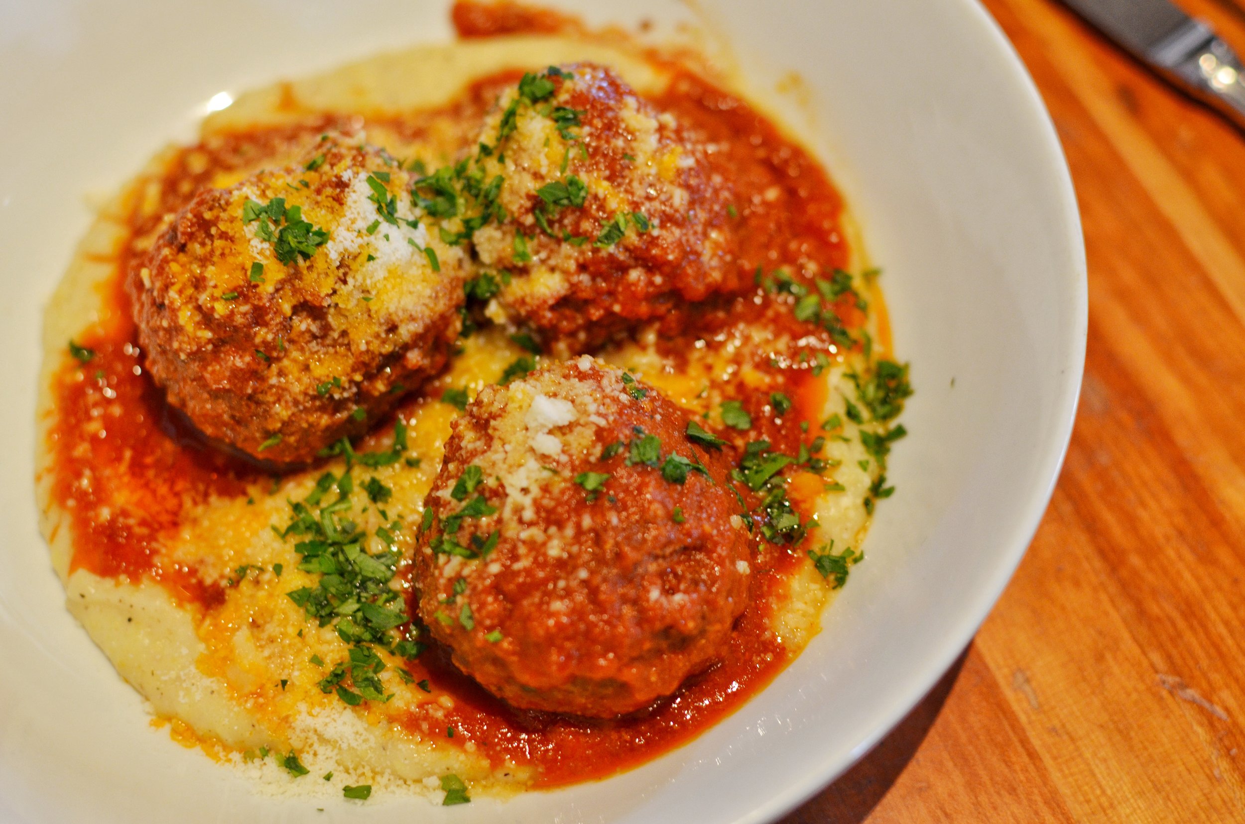 Beef and ricotta meatballs with creamy parmasean polenta