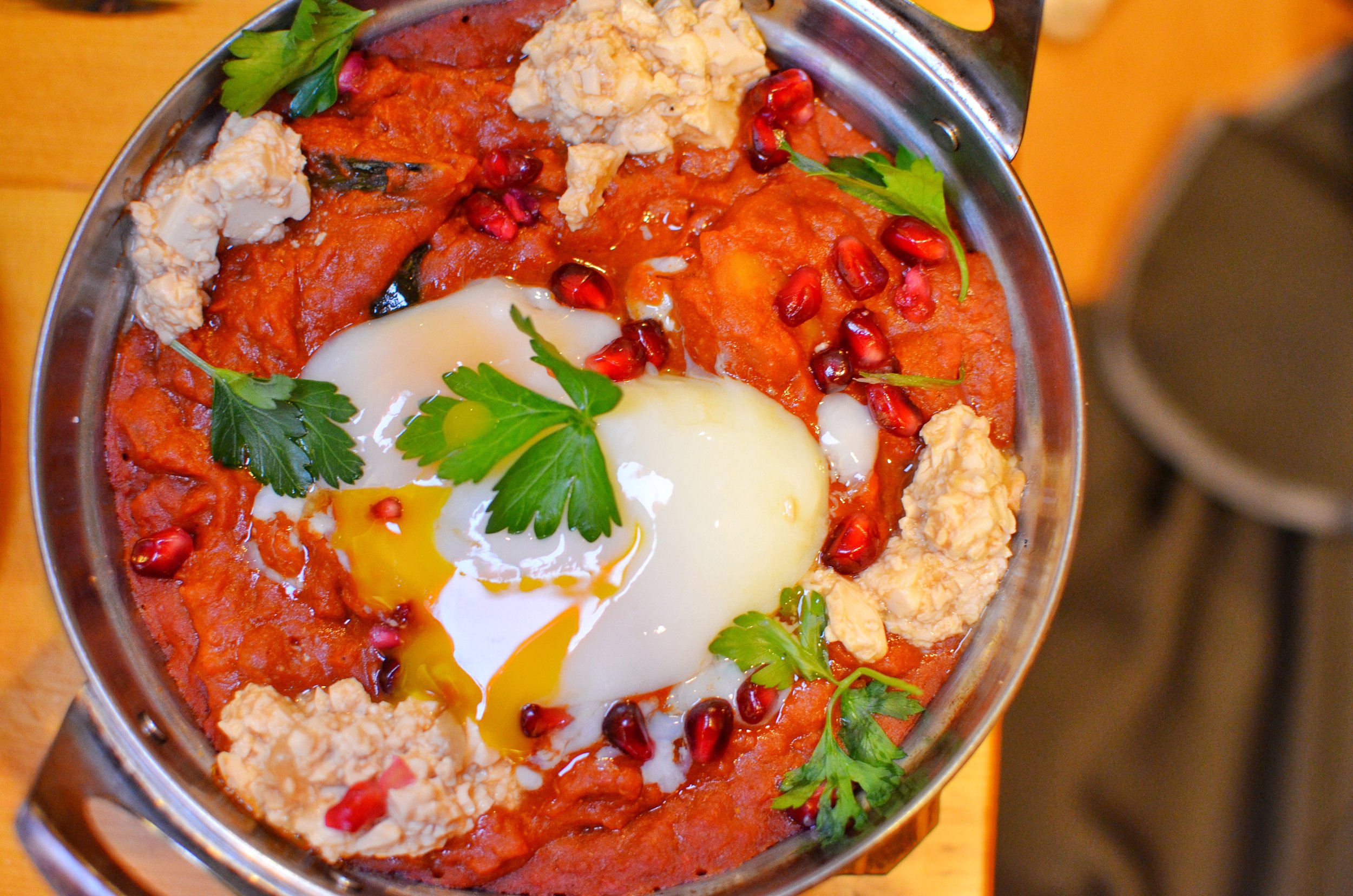 Kabocha Shakshuka- curried kabocha, baked eggs, miso labne, poached eggs, side of thick cut milk toast