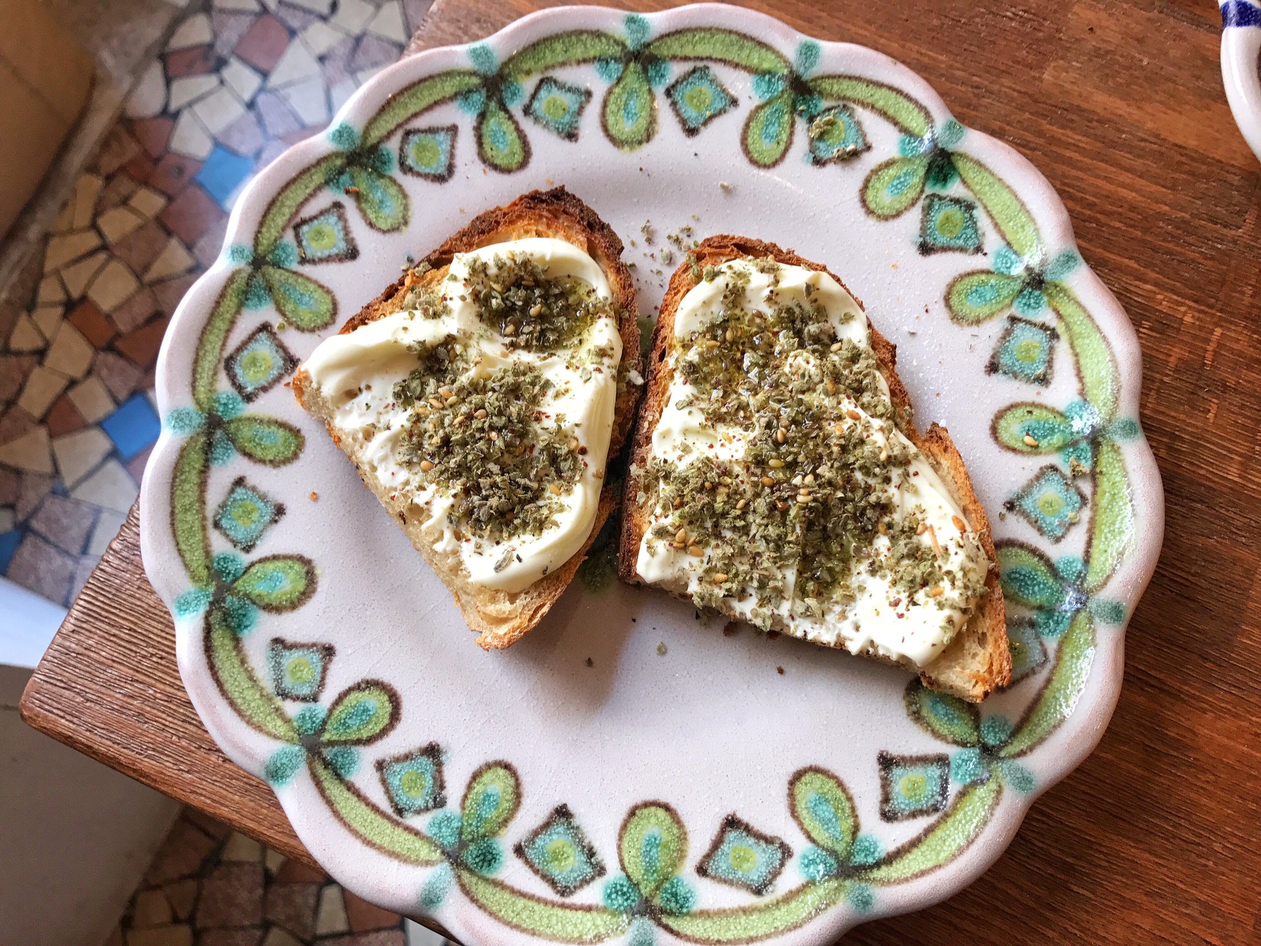 Labne with za'atar on toast- The labneh was delicious, creamy and had the perfect amount of za'atar on it.
