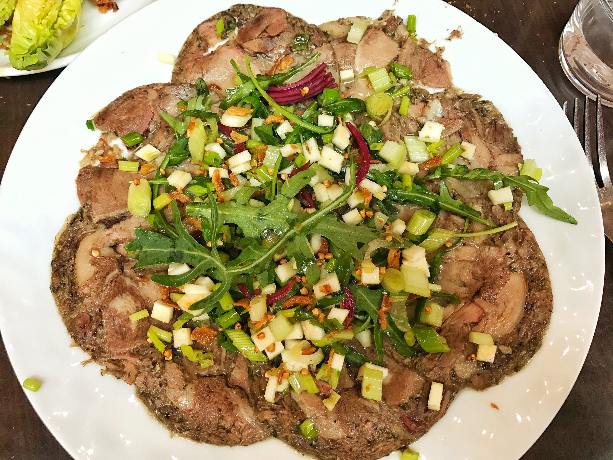 Beef carpaccio- This carpaccio is different from what I am used to. I've always had carpaccio which was raw meat. I liked the spring salad on top especially the onions which cut through the "meatiness" of it all but I definitely carpaccio when it is raw. 