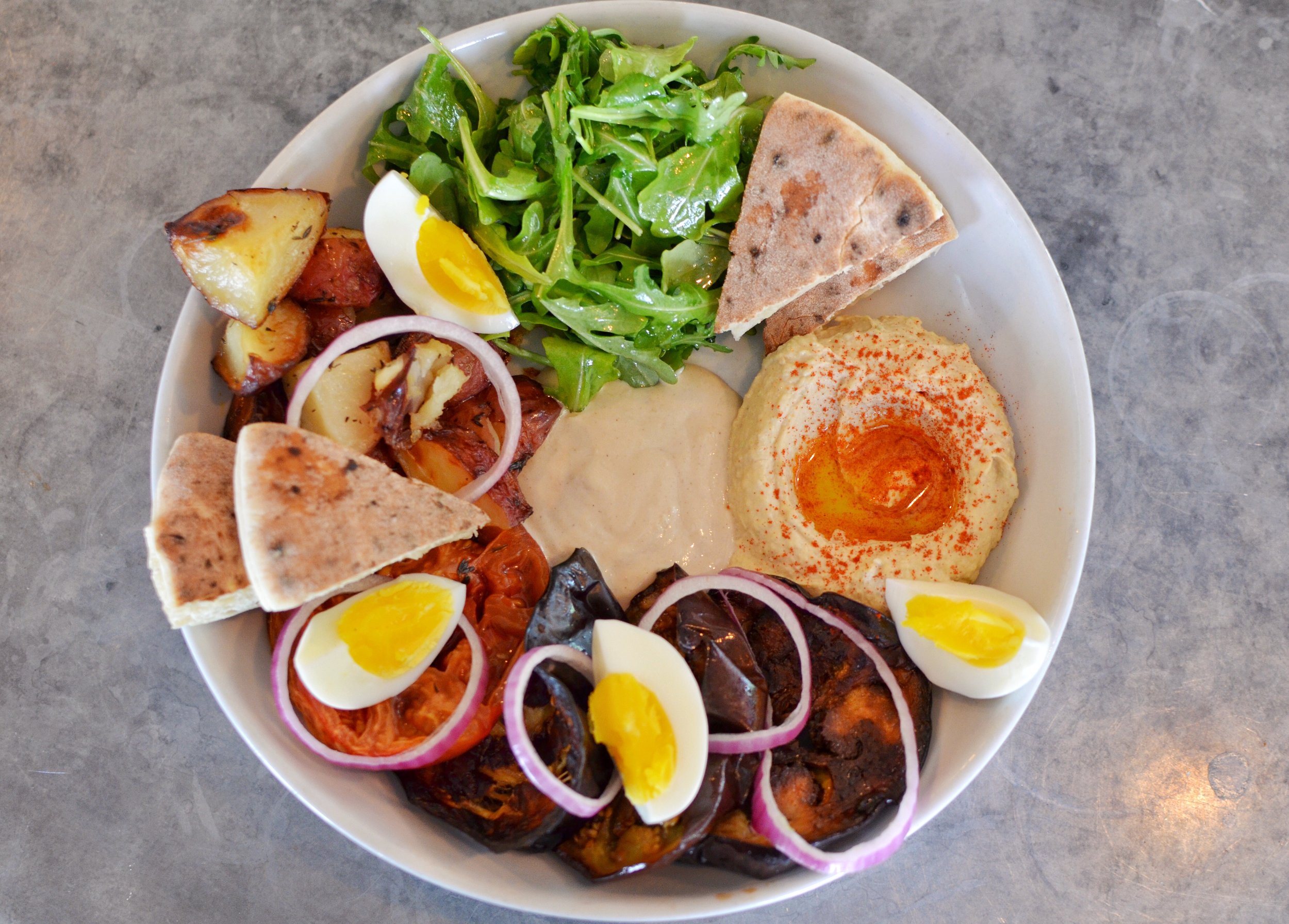 Sabich platter- tahini, hummus, boiled eggs, tomato, eggplant, onions