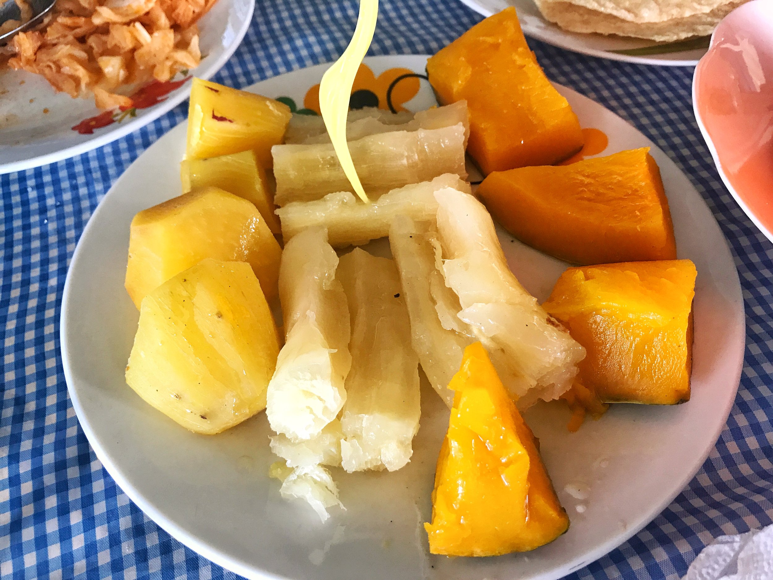 Assortmenet of potatoes picked from the farm including sweet potato, yuca and more