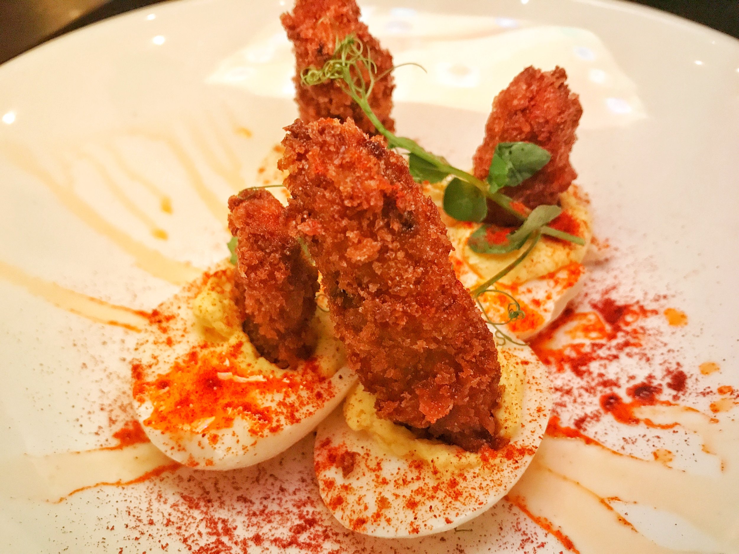 Deviled Eggs with Chicken Fried Oyster with scallion, sambal
