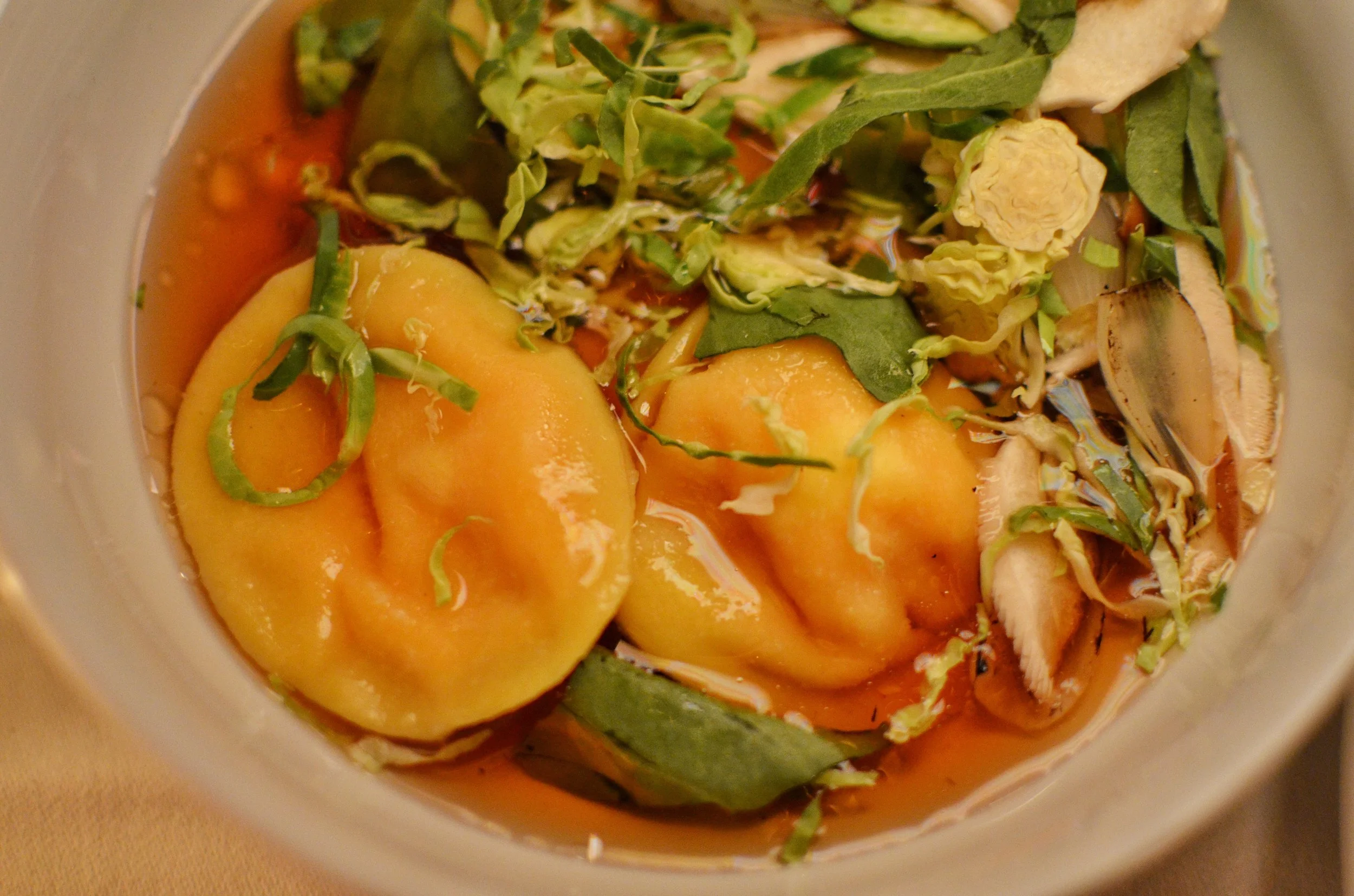 Pumpkin ravioli, shiitake consomme, fall spices