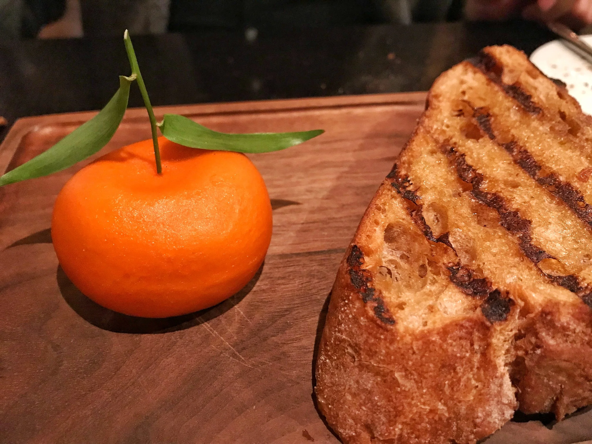 Just a mandarin and grilled bread? I don't think so