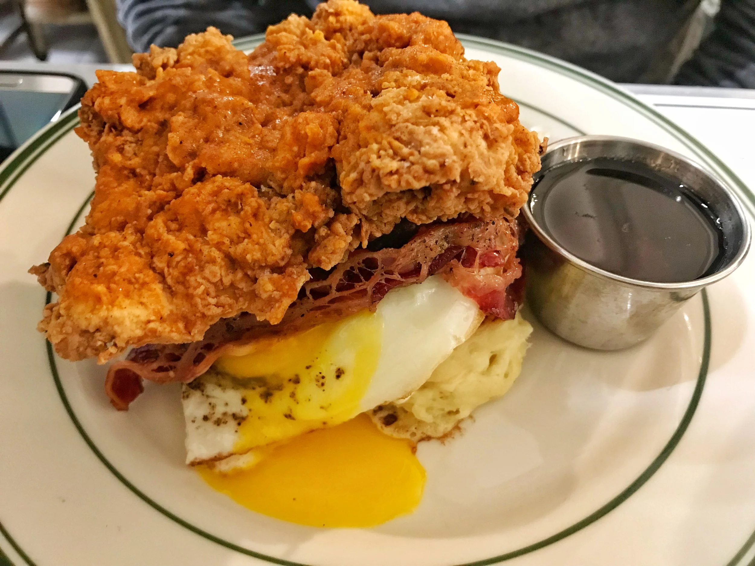No Budget Brit’s Schnitzel: chicken schnitzel, whipped honey, french dressing with an added fried egg